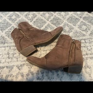 Brown suede booties with gold zipper detail